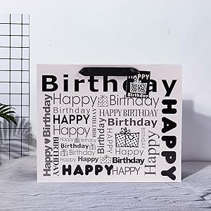 white and black gift bag